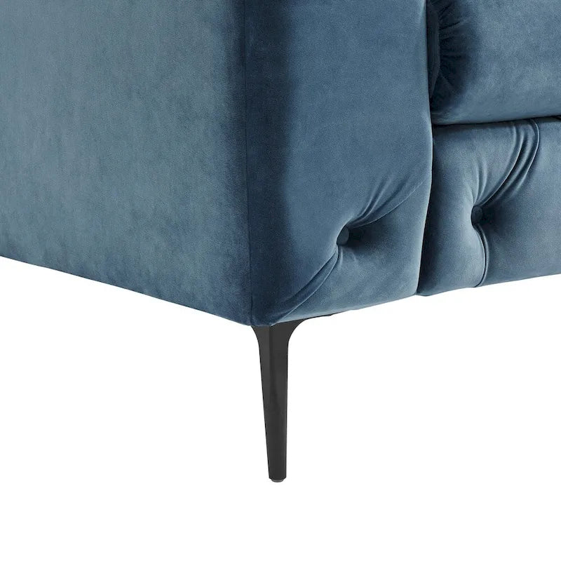 Pikowana dwuosobowa sofa z aksamitu i podłokietnikami w kształcie wałków