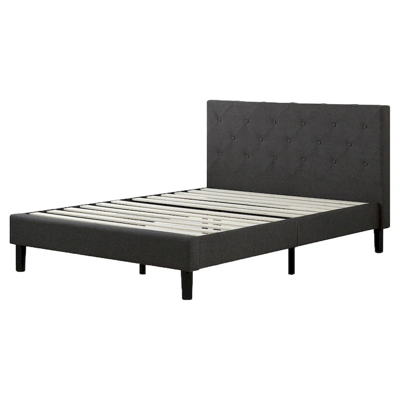 Cama tipo plataforma tapizada en gris oscuro con cabecero con costuras en rombos