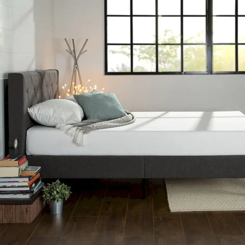Letto con base a piattaforma imbottito grigio scuro con testiera trapuntata a rombi