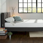Letto con base a piattaforma imbottito grigio scuro con testiera trapuntata a rombi