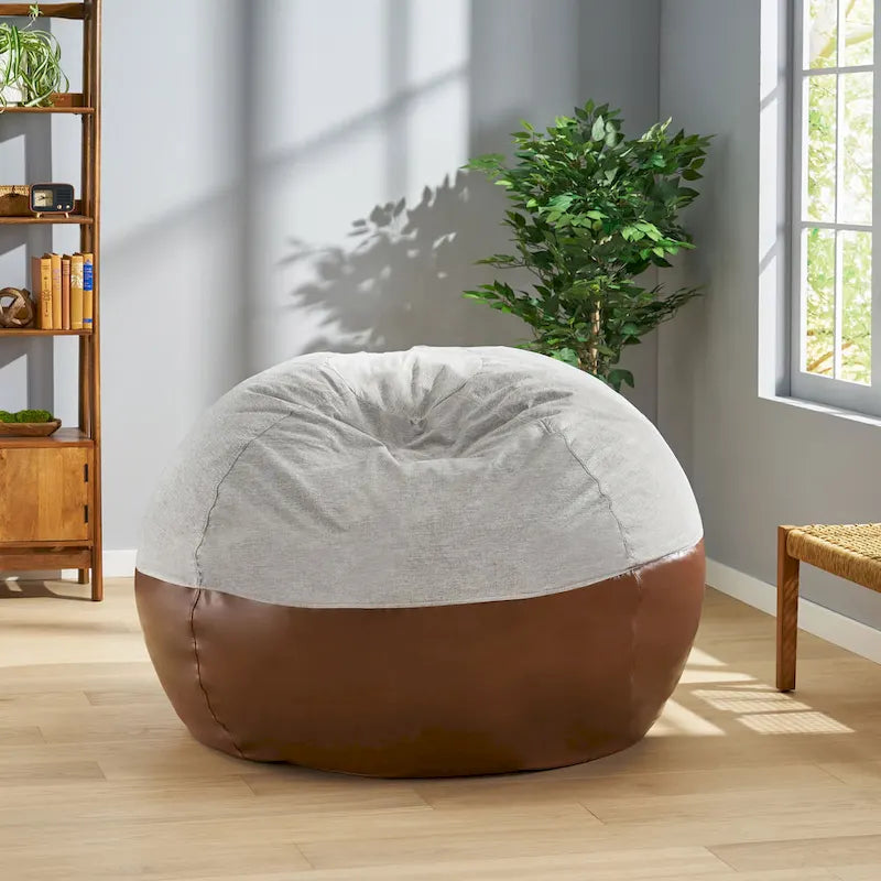Puf tipo bean bag de tela y cuero sintético de dos tonos