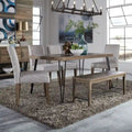 Mesa de comedor rectangular con tablero en patrón de espiga