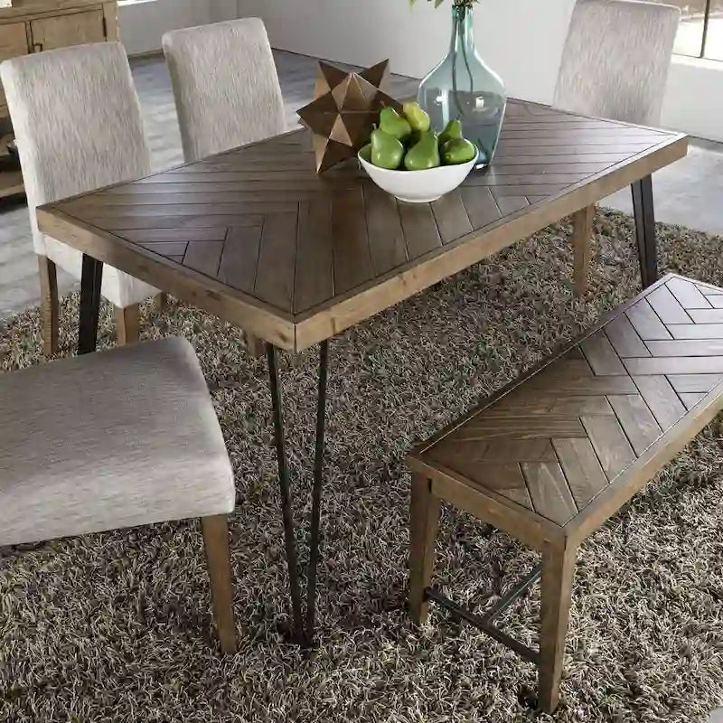 Mesa de comedor rectangular con tablero en patrón de espiga