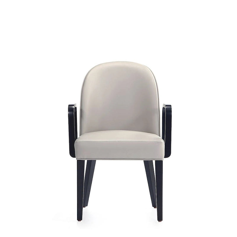 Sillón de comedor tapizado de cuero sintético y terciopelo